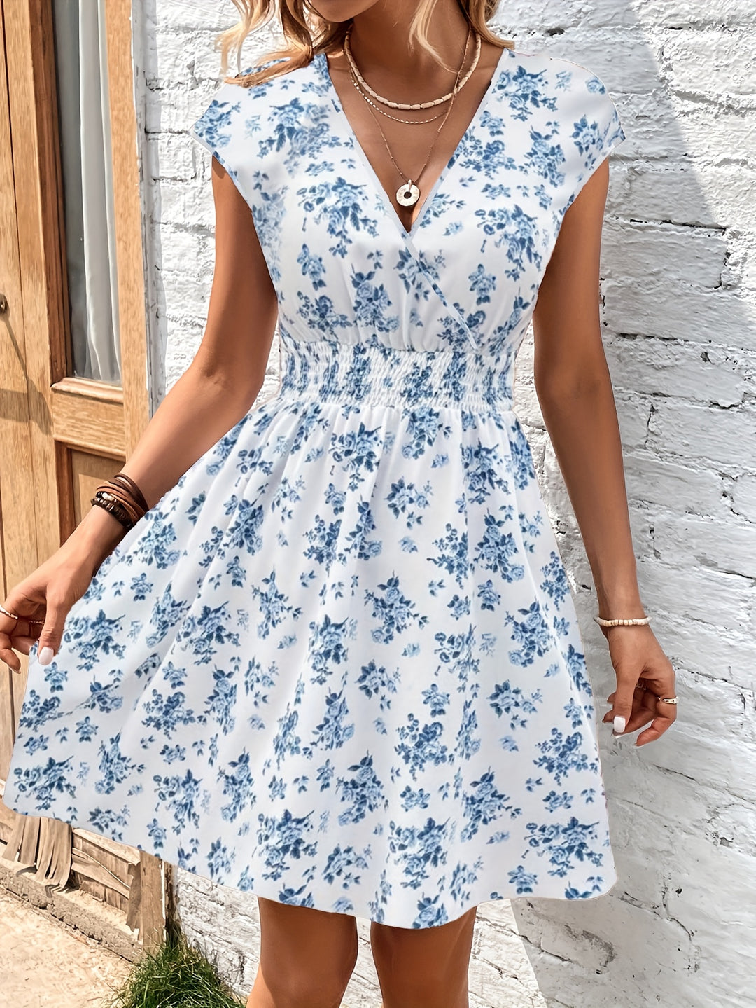 Floral Surplice Neck Smocked Mini Dress